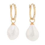 Large Keshi Pearls hanging from a gold vermeil hoop with a white background