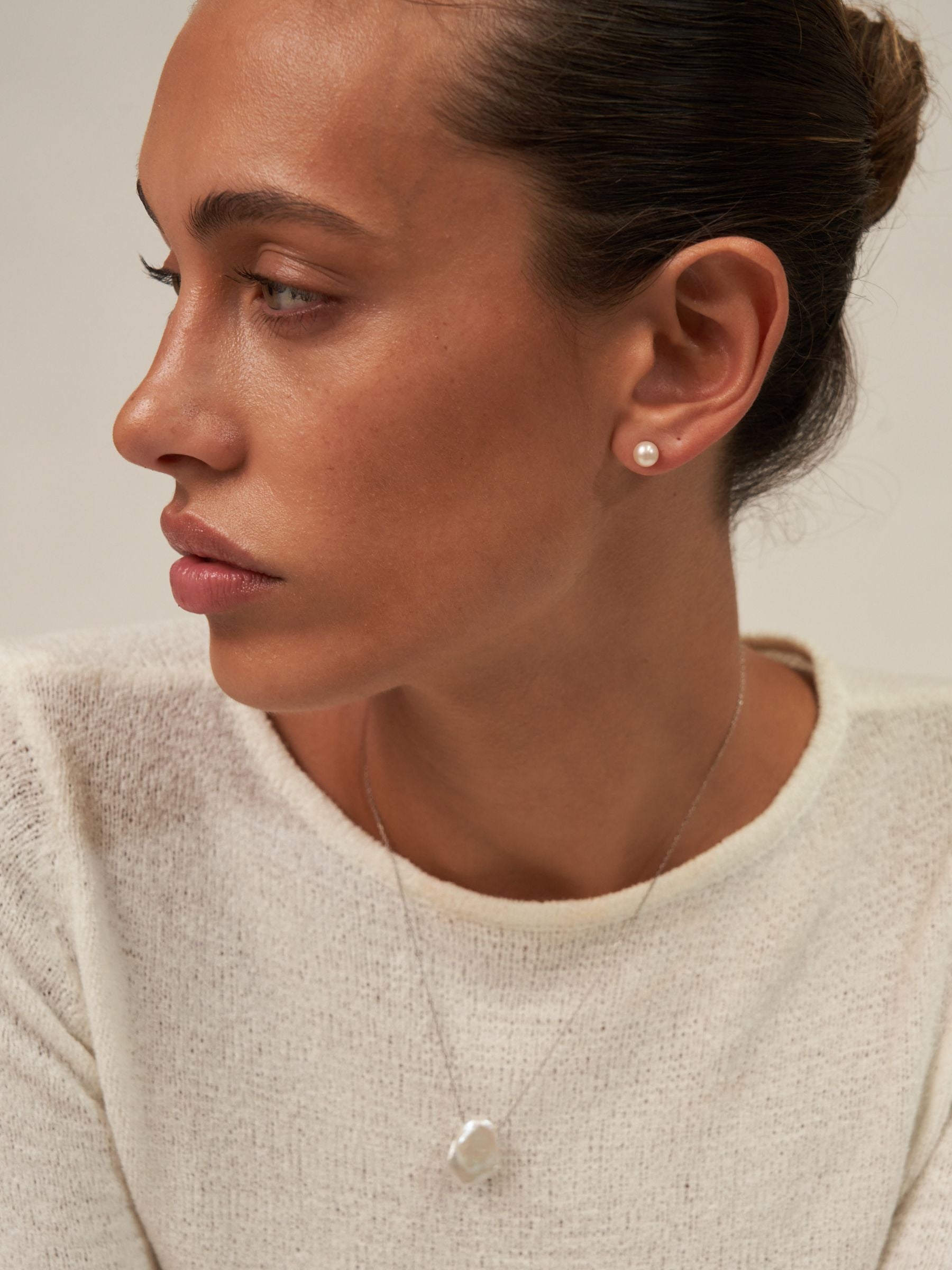 Small pearl stud earrings