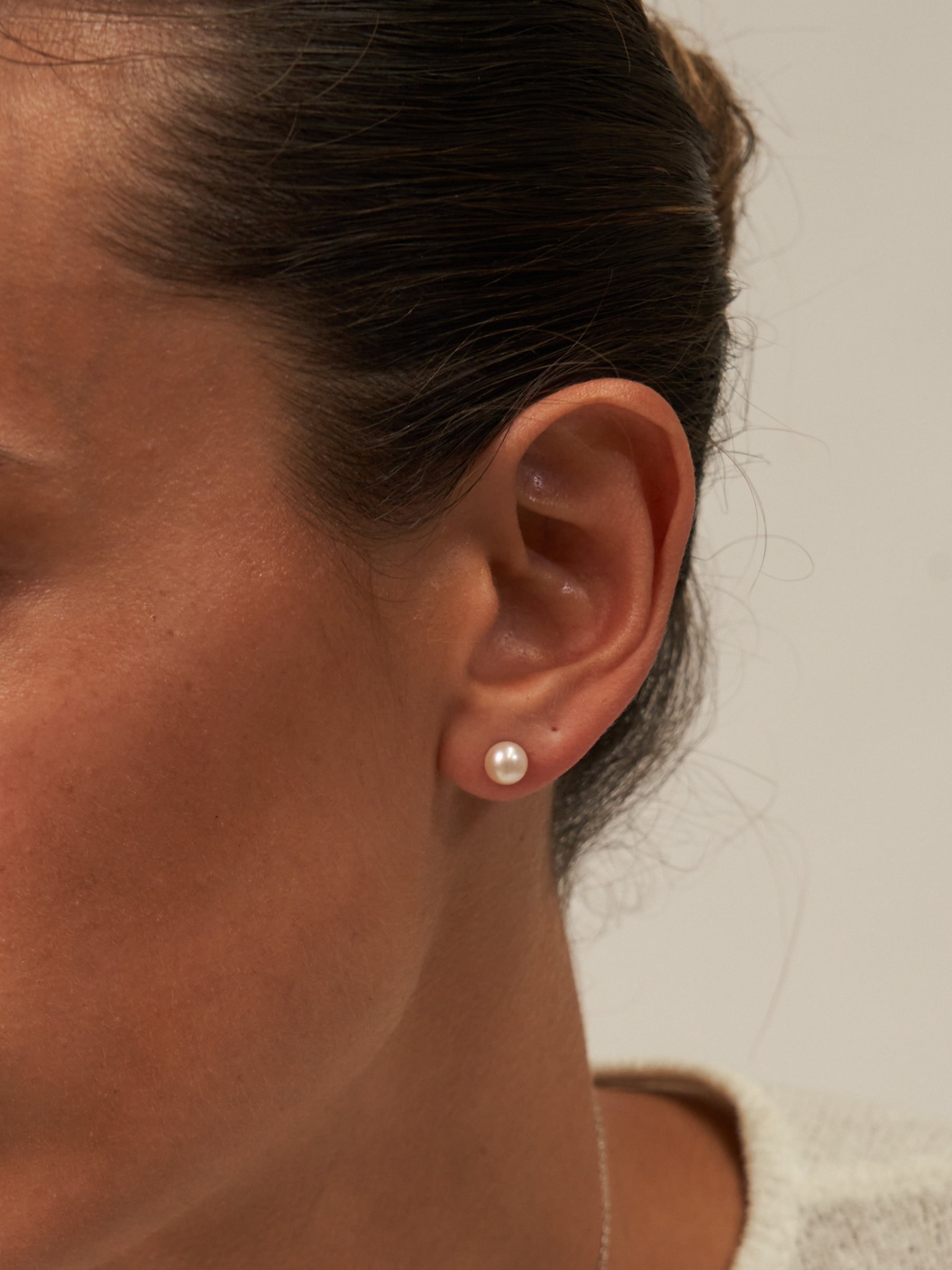 Small pearl stud earrings