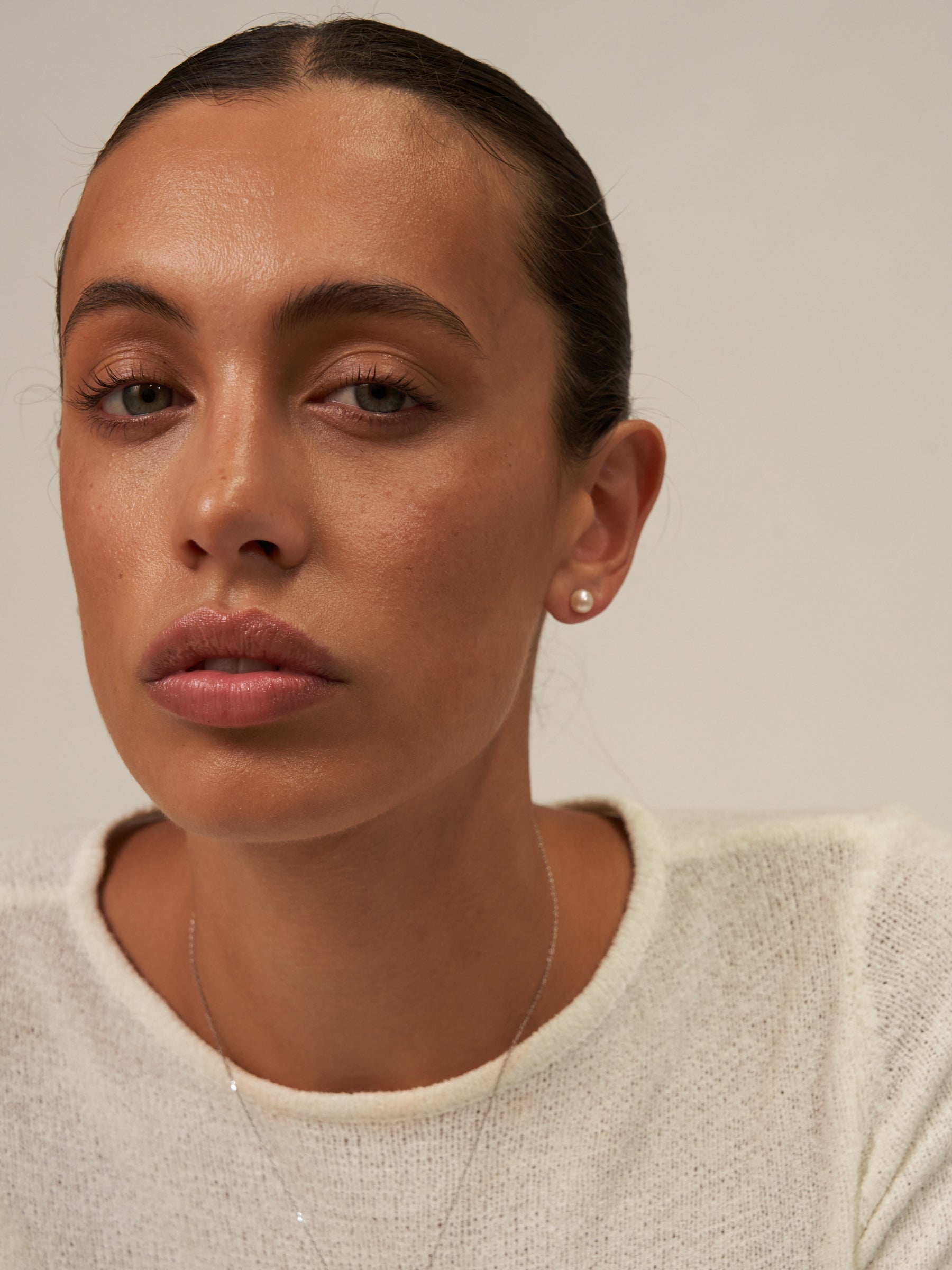 Small pearl stud earrings