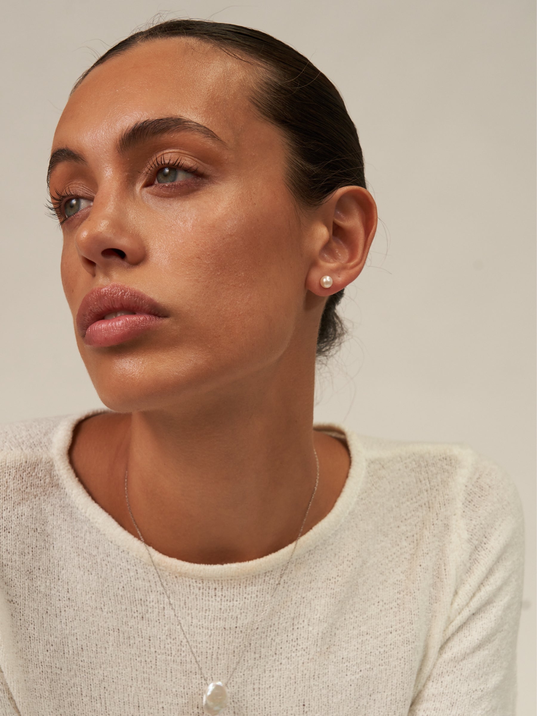 Small pearl stud earrings