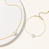 Pearl necklace and bracelet set in gold chain