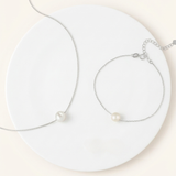 Pearl necklace and bracelet set in silver chain