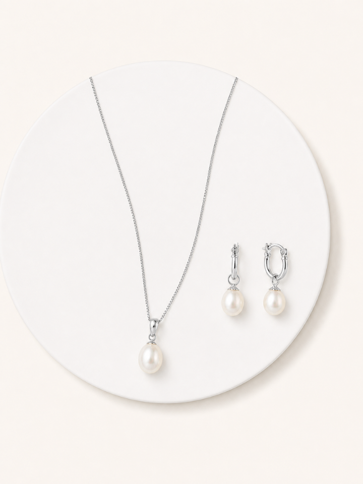 Pearl drop necklace and earrings in silver chain set