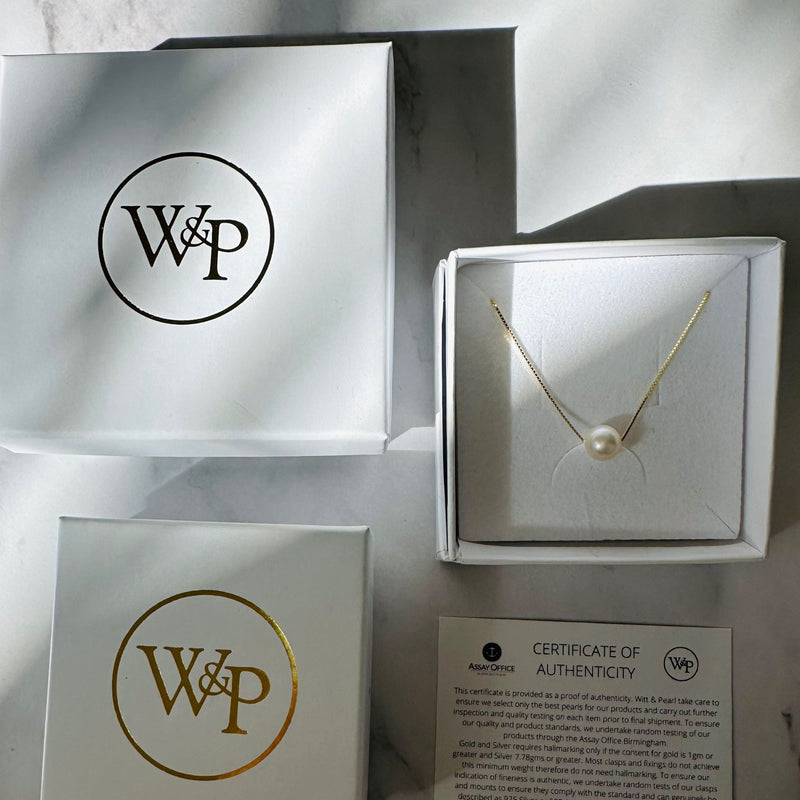 single pearl choker necklace on gold chain