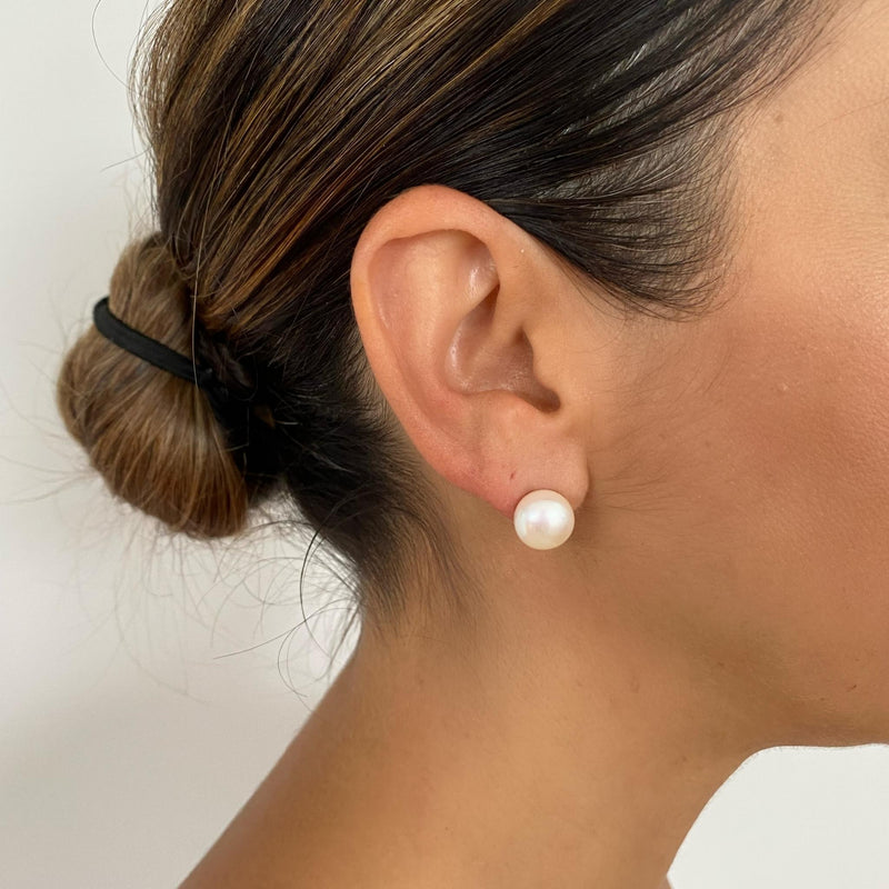 Elizabeth white pearl studs close up