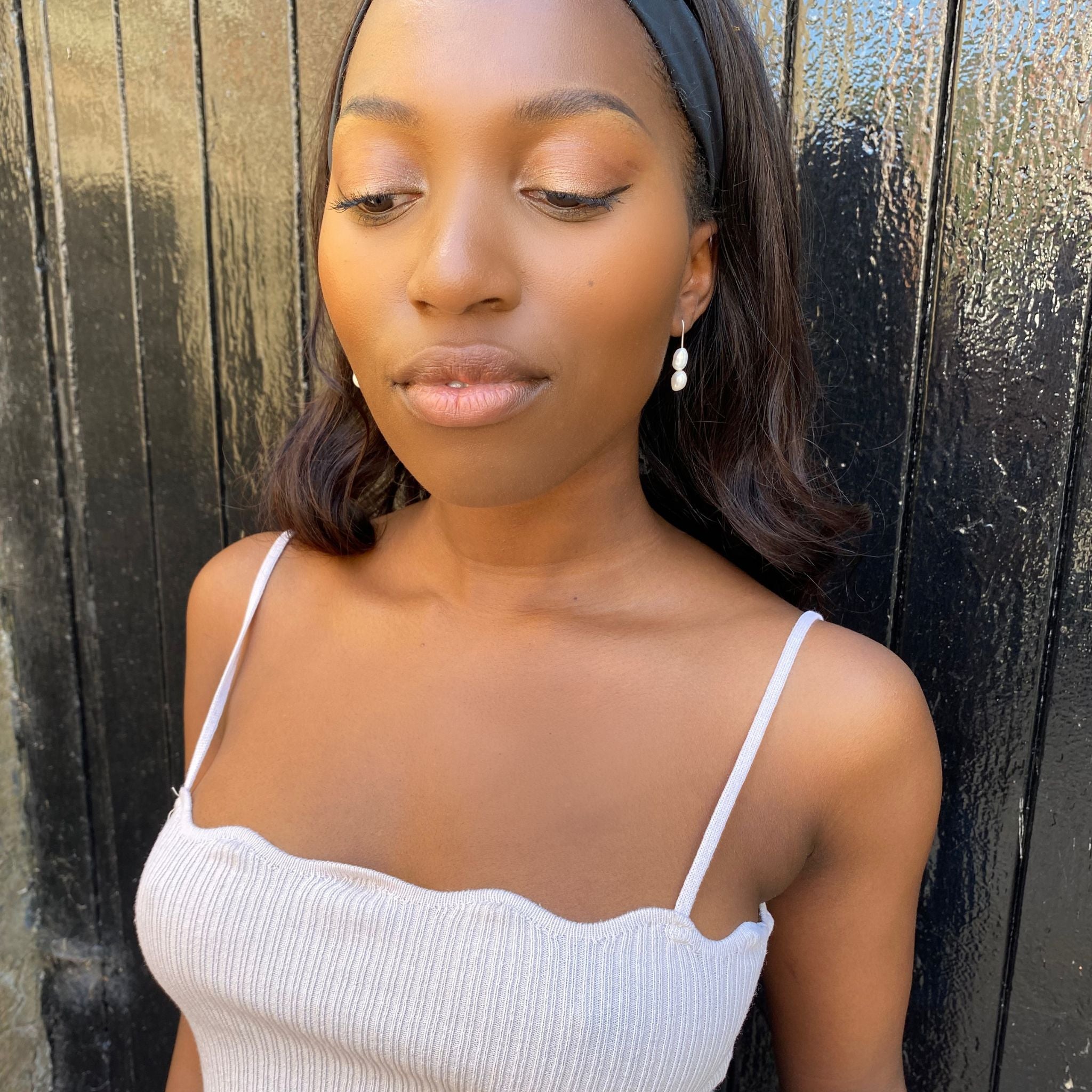 Two Pearl dangle drop earrings