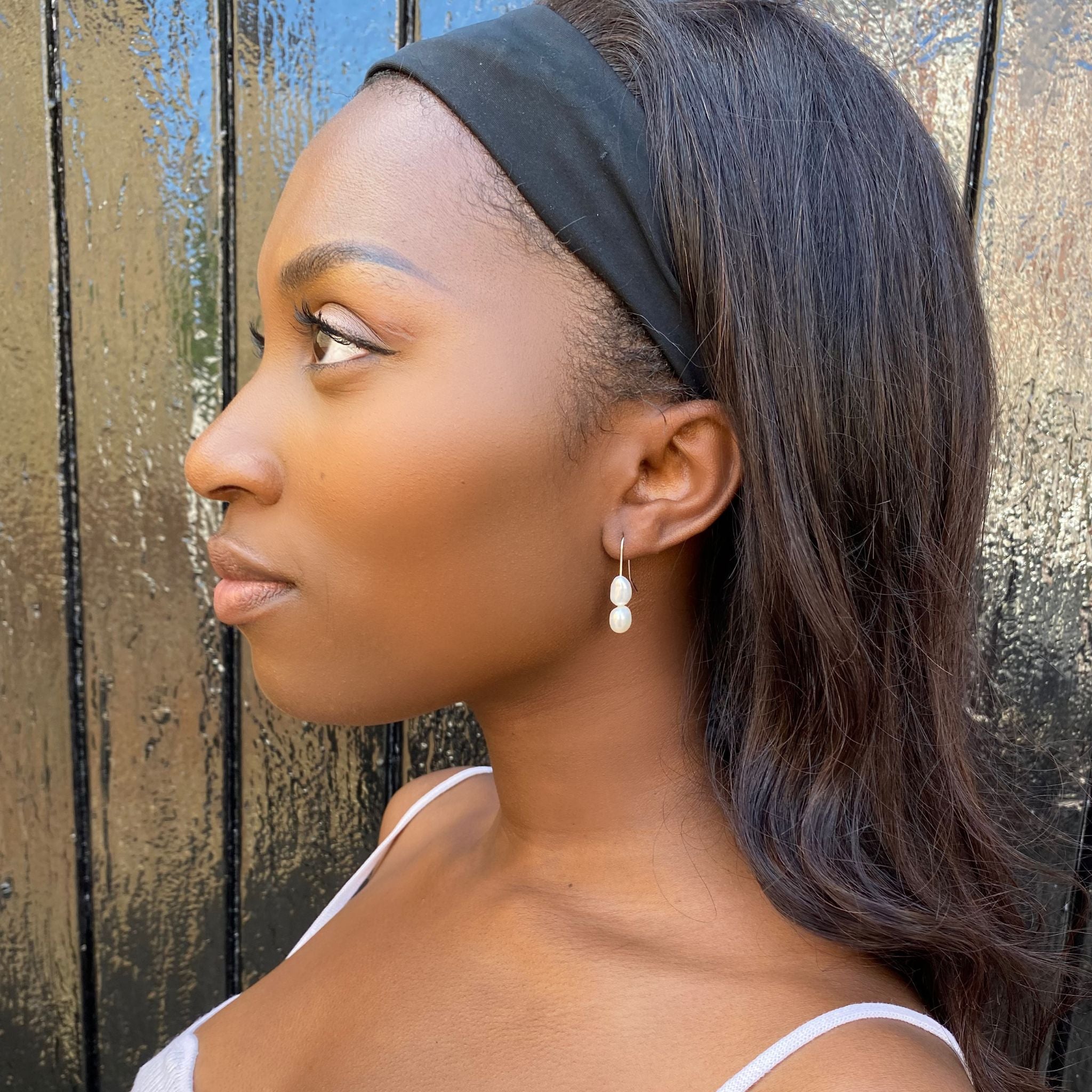 Two Pearl dangle drop earrings