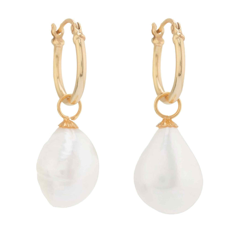 Large Keshi Pearls hanging from a gold vermeil hoop with a white background