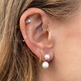 Pia earring close up with other earrings