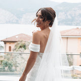 bride wearing the rebecca hoop pearl earrings