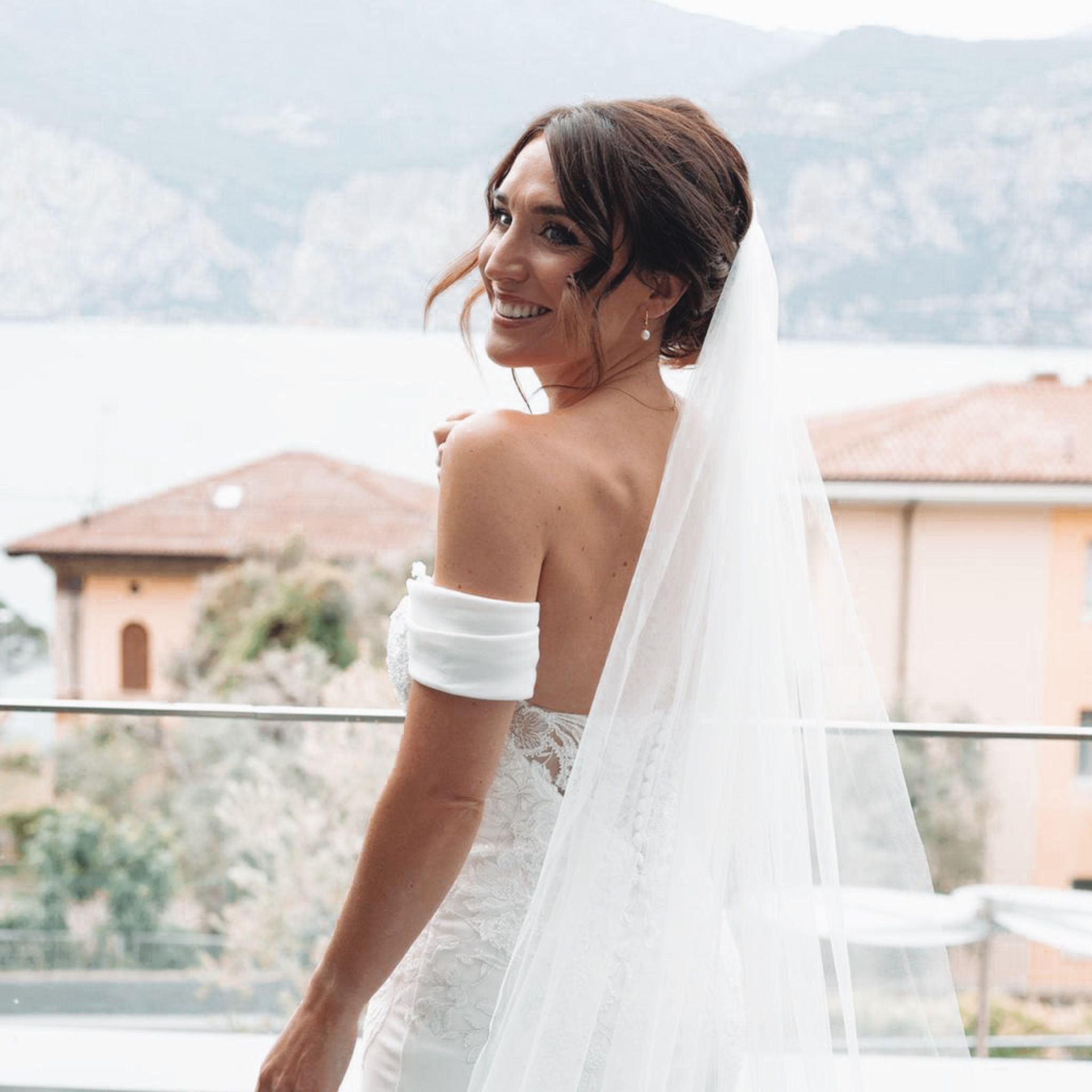 bride wearing the rebecca hoop pearl earrings